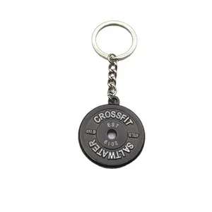 Metallic charm keychain with Gym Addict label